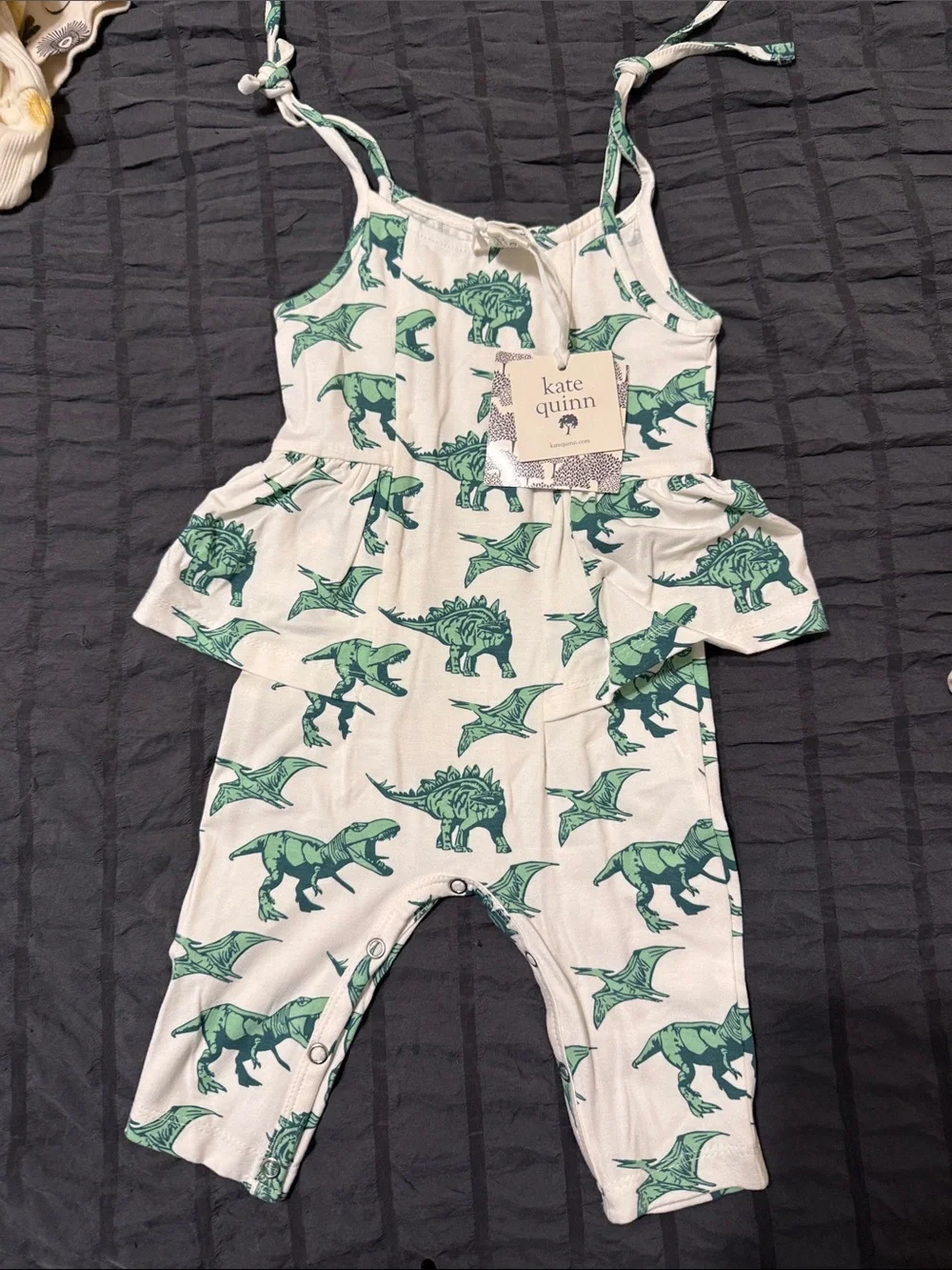 kate quinn white romper with green dinosaur print